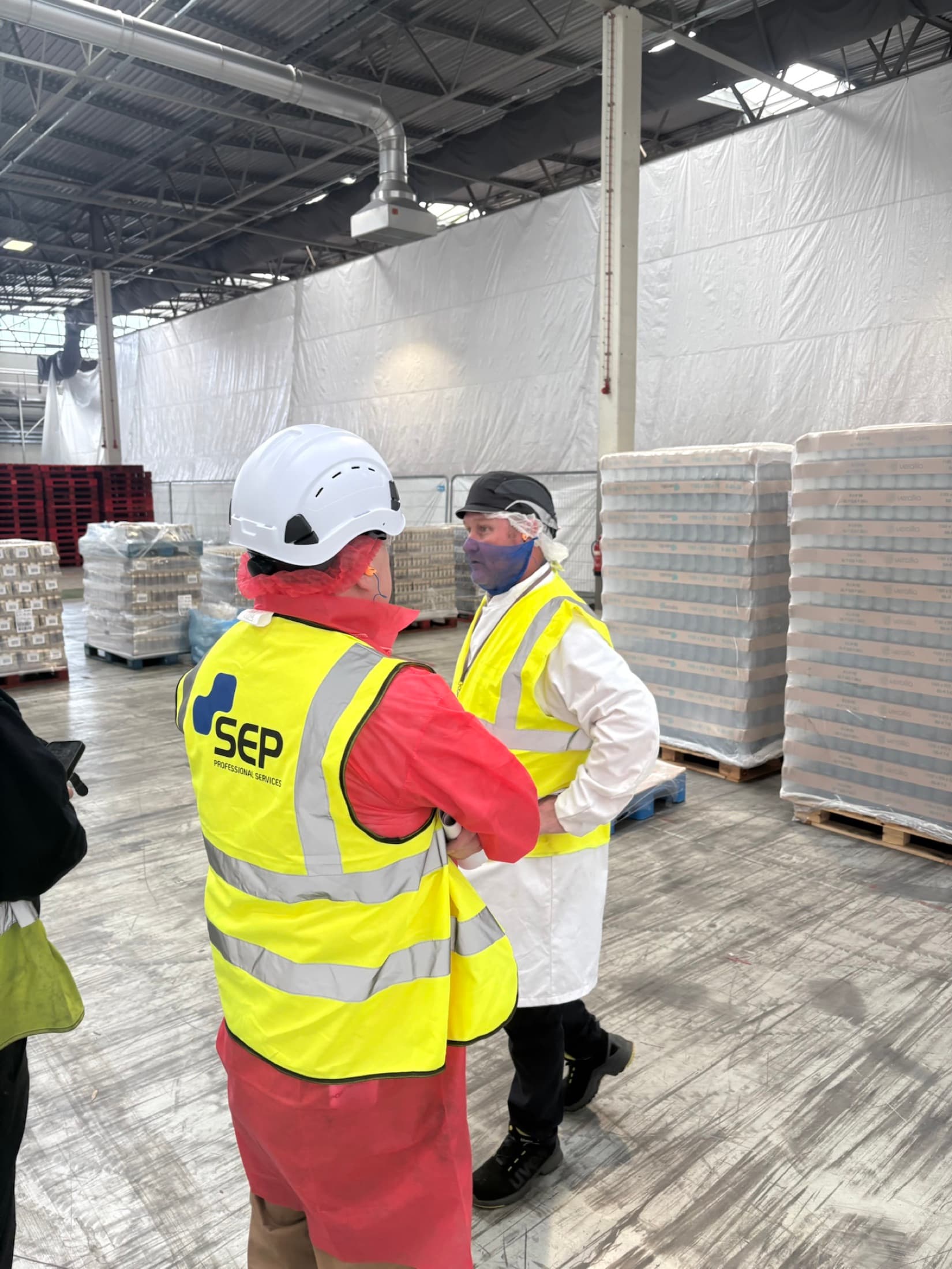 SEP site manager inspecting completed food-grade production corridor